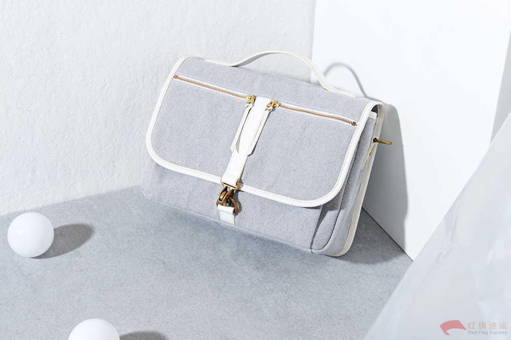 16392103051370.jpg 攝圖網_500990327_包包女士男士手提包錢包斜挎包背包(企業(yè)商用)_副本.jpg